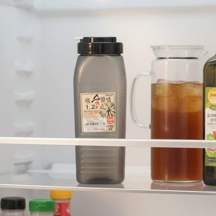 Korean Charcoal-Design Slim Fridge Water Bottle – Wide Mouth, Easy-Pour Spout, 1.2L (BPA-Free)